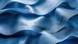 © Hryhor Denys - Detailed close up view of a blue fabric with wavy shapes, highlighting the texture and color of the material