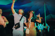 © Jacob Lund - Young couple partying hard at a lively summer music festival