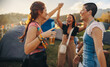 © Jacob Lund - Fun moments unfold as three female friends unite in laughter, dance, and celebration at the summer music festival