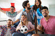 © NDABCREATIVITY - Excited fans of soccer friends celebrating winning match