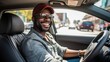 © inna717 - Side portrait of happy african american man driving car