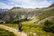 Young hiker woman in Vall de Boi, Aiguestortes and Sant Maurici National Park, Spain