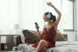 © StockPhotoPro - Young woman listening to music