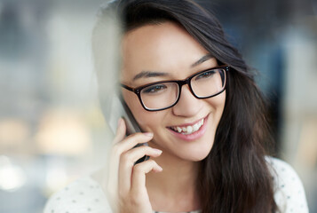 Poster - Happy, phone call and Asian woman by window in office for communication, networking or contact. Smile, technology and female creative designer with cellphone for mobile discussion in workplace.