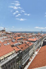 Canvas Print - Aerial view of buildings and landmarks in Lisbon Portugal with incredible architecture and a blue sky background. 