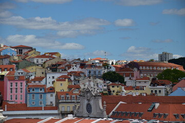 Canvas Print - Aerial view of buildings and landmarks in Lisbon Portugal with incredible architecture and a blue sky background. 