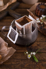 Canvas Print - Coffee in a drip bag in a transparent mug