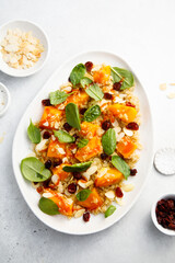 Wall Mural - Quinoa salad with pumpkin, spinach and cranberry