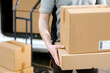 © StockPhotoPro - Express courier delivering packages at home