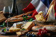 © SARATSTOCK - French food and wine creative background for menu and restaurant. Typical gourmet in France. Wine, cheese, baguette with french flag. Food menu, copy space design.