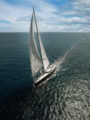 Sailing yacht at Mediterranean Sea. Sail. Boat. Helicopter view. Aerial.