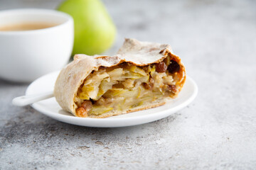 Wall Mural - Homemade apple strudel with raisins