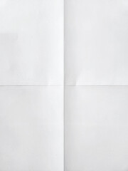 white sheet of paper folded in four