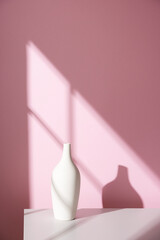 Wall Mural - A simple interior background with warm sunlight streaming in through the window.