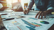 © pilipphoto - Business consulting meeting, people working and brainstorming new business project finance investment, planning, strategy, new business