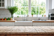 © organik - Wooden table on blurred kitchen bench background. Empty wooden table and blurred kitchen background