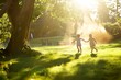 © tantawat - A candid moment of children playing in a sunlit park, capturing the joy and innocence of childhood