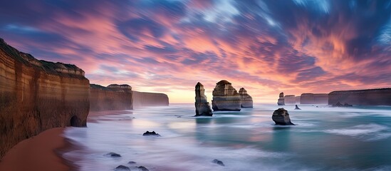 Wall Mural - Before sunrise on the Great Ocean Road there is an iconic formation known as the Twelve Apostles with a breathtaking view that offers ample copy space for images