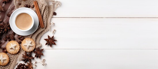 Aufkleber - Cozy autumn or winter composition with a cup of coffee cozy knitted plaid chocolate cookies cinnamon sticks star anise and dry leaves on a white background Top view with copy space image