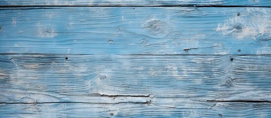 Aufkleber - An aged wooden texture in light blue with peeled paint suitable for copy space image