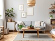 © Muhammadlmran - Scandinavian style living room interior with a gray sofa, wooden coffee table and modern cabinet near the wall with poster frames