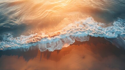 Wall Mural - Aerial view of a long, winding coastline bathed in the golden light of a sunset, casting long shadows on the sandy beach