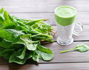 Sticker - spinach smoothie and fresh spinach on the table