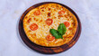 © Tural - Delicious Italian pizza isolated top view