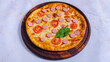 © Tural - Delicious Italian pizza isolated top view
