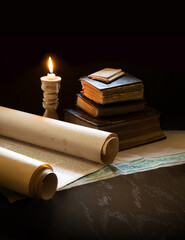 Wall Mural - Still life from ancient books with candles