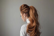 © Russell - Voluminous High Ponytail - A statement-making and glamorous ponytail style with added volume, achieved through teasing or backcombing the hair at the crown for a dramatic and head-turning effect