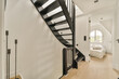 © ADDICTIVE STOCK - Modern staircase design in a bright home interior