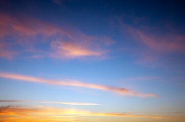 Wall Mural - Sunset sky with pink clouds