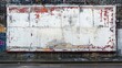 © aicandy - An old, weathered blank billboard on a brick wall with peeling paint and graffiti, creating an urban, gritty street scene
