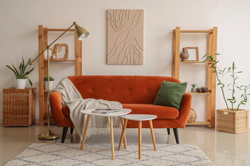 Sticker - Interior of light living room with brown sofa and coffee table