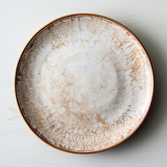beautiful handmade dinner plate with earth and natural tones, very wabi-sabi and trendy feel, isolated on a neutral background
