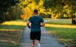 © Malik Nalik - Runner man running or jogging at the park active healthy lifestyle.