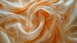 © Mikus - A tight shot of an orange-white fabric, adorned with copious ruffles at its top and lower hem