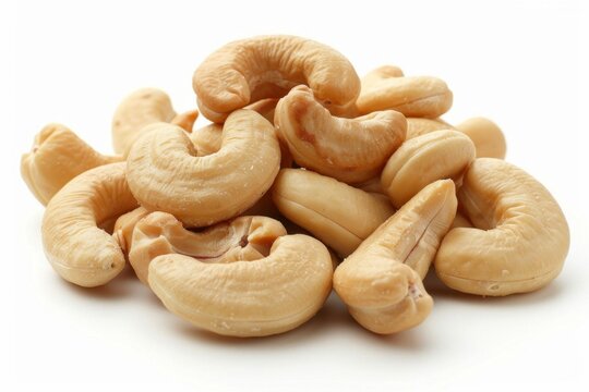 A pile of cashews on a white background