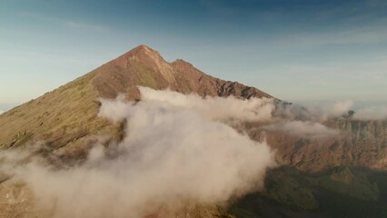 Wall Mural - Aerial view of Rinjani volcano summit in a morning sunrise, Lombok island in Indonesia, Asia