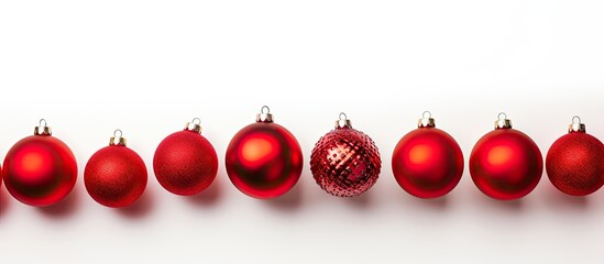 Canvas Print - A red Christmas decoration is displayed on a white background in a flat lay copy space image