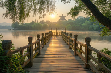Wall Mural - A wooden bridge over the lake, with lush greenery and trees on both sides.