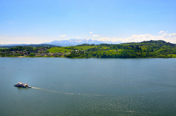 Poster - Boat floating on water near mountains and trees