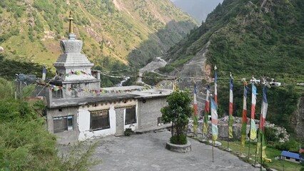 Wall Mural - Tibetan Buddhist pagoda in Syabrubesi village a beautiful resident village inside the Langtang National Park of Nepal. 