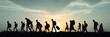 © john - Silhouette of refugees people walking