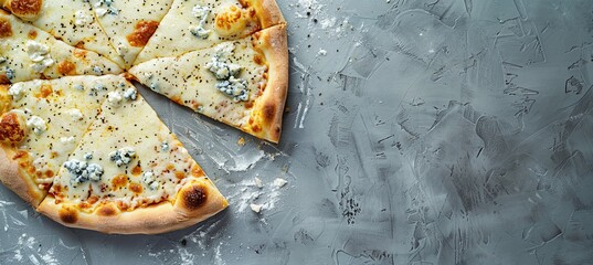 Wall Mural - Four Cheese Pizza: A gray background showcases a top-down view of a four cheese pizza split in half