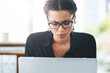 © peopleimages.com - Stress, worry and business woman with laptop in office confused by report, feedback or review. Questions, unsure and girl manager with reading glasses for online, glitch or concerned by 404 error