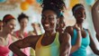 © GestureShot - Vibrant Fitness Class with Smiling Instructor
