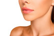 © deagreez - Profile side view cropped close up photo of dreamy sweet well-groomed lady with her naked shoulder she isolated on pastel beige background stand half turn to camera focus on lips