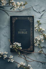 The holy bible, flat lay with flowers, pastel blue background and aesthetic spring flowers